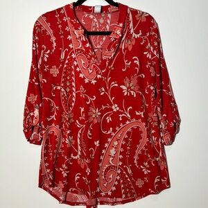Size L - Fits size 12-14
Tunic 3/4-sleeve. Stretchy